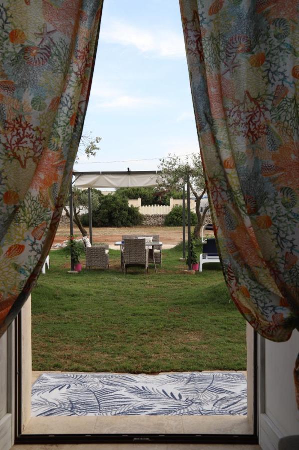 Il Casale Di Punta Prosciutto Acomodação com café da manhã Exterior foto